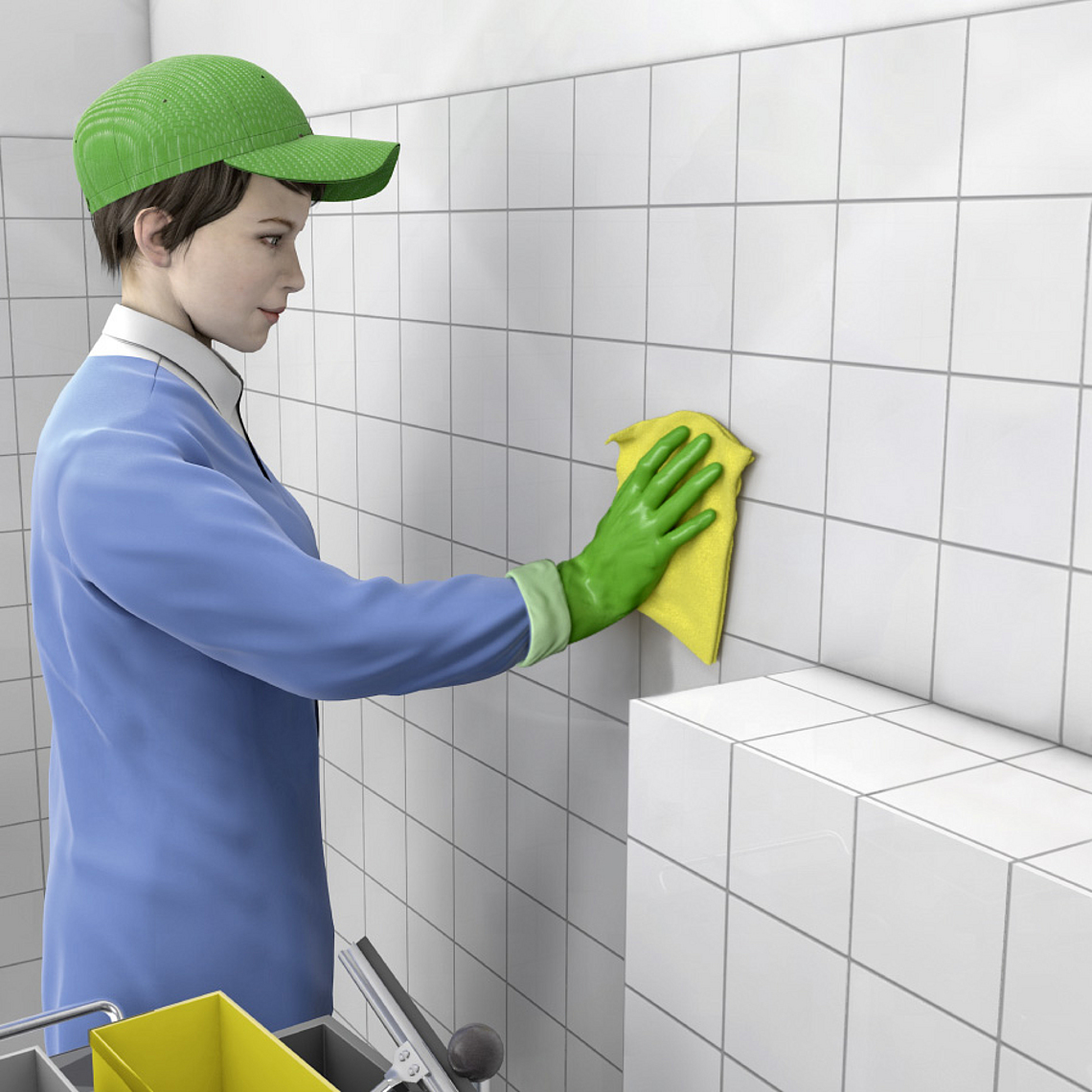 Eine Gebäudereinigerin trägt Handschuhe und wischt eine Wand mit Fliesen. 