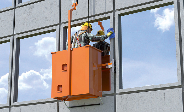 Ein Gebäudereiniger mit Nackenschutz steht auf einer Fassadenbefahranlage und reinigt eine Fensterfassade Person  in einer Befahranlage.
